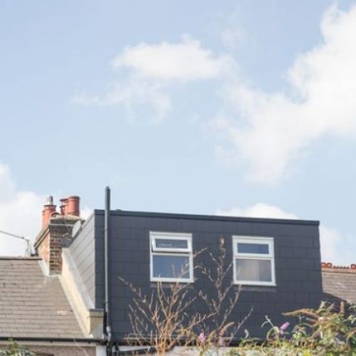 Outside view of a Victorian Terrace in London with a dormer roof and windows added